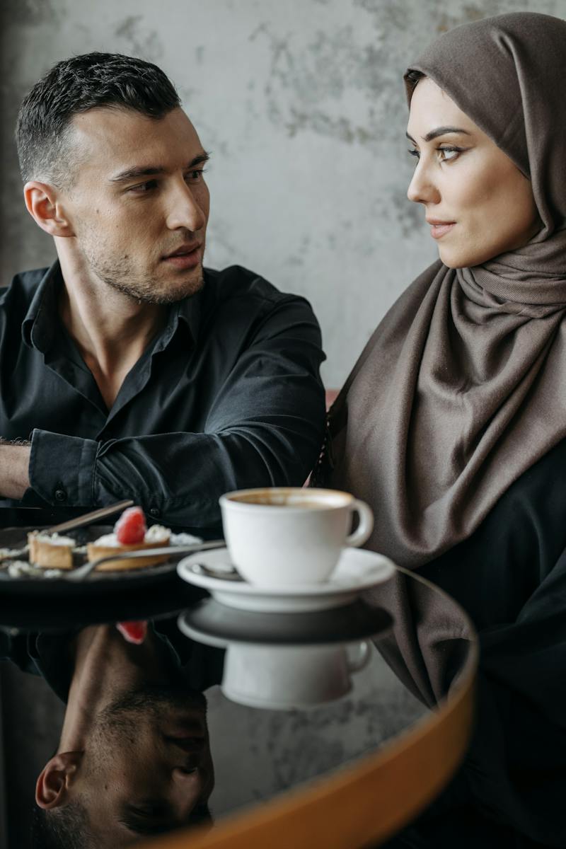 muslim couple staring at each other